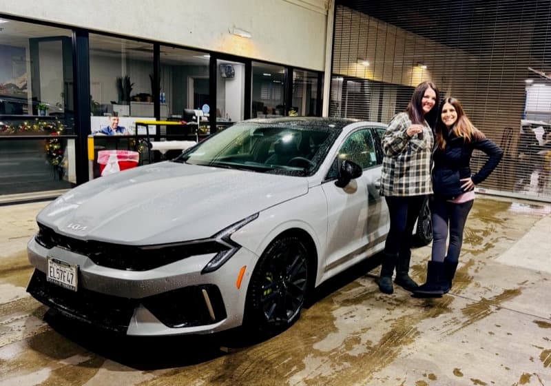 Julie and Adrienne with their new Kia K5 GT